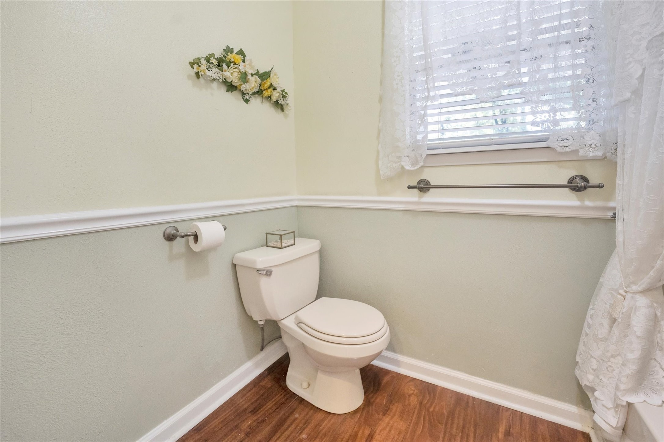 3197 Mann Road Conroe, TX 77303 - Photo 34 of 48 a bathroom with a toilet and a sink