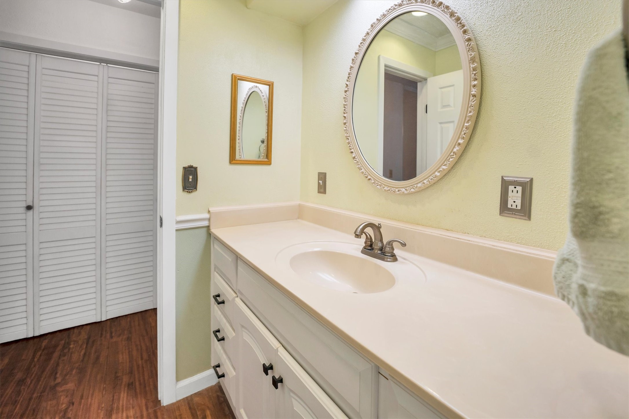 3197 Mann Road Conroe, TX 77303 - Photo 36 of 48 a bathroom with a sink and a mirror