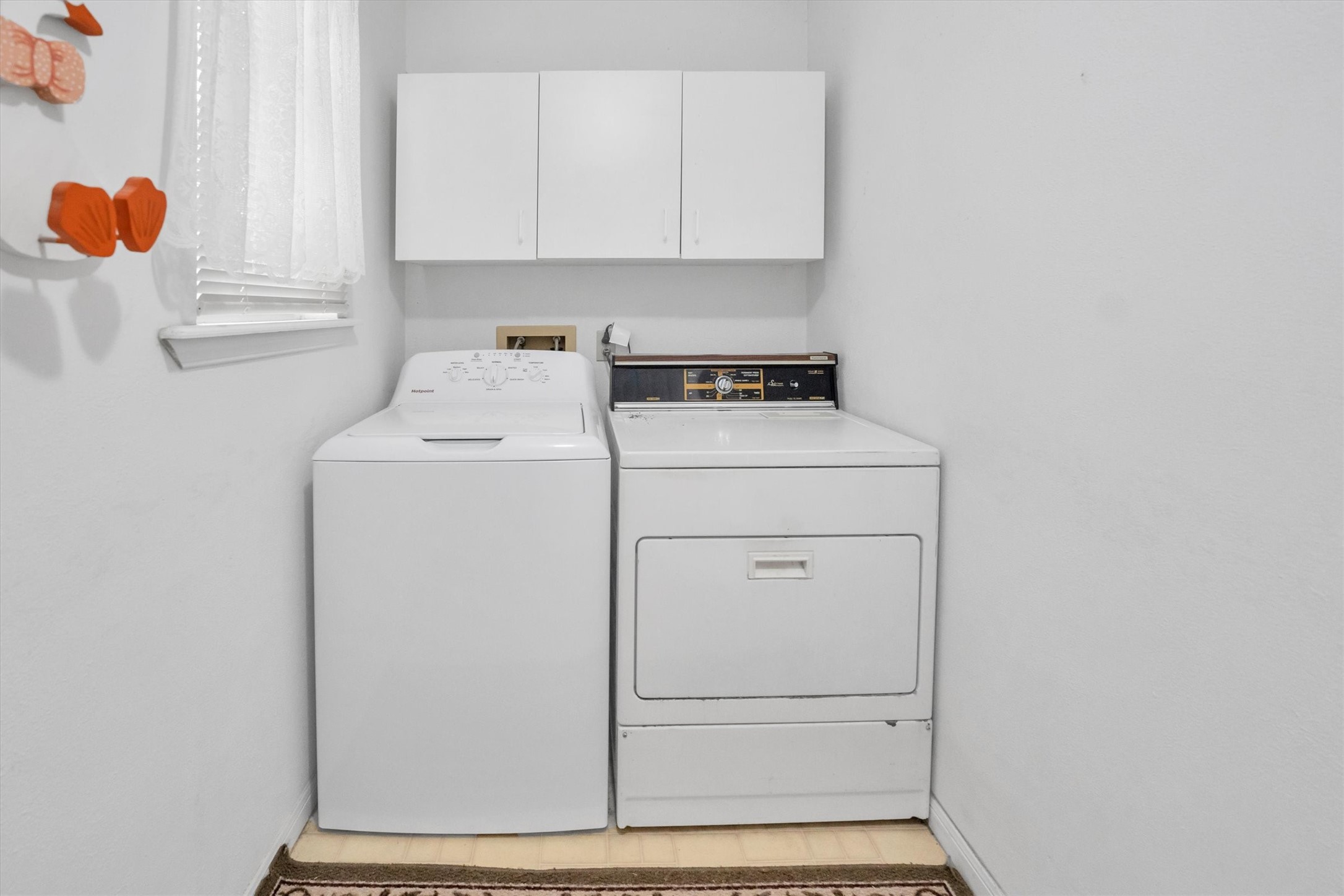 3197 Mann Road Conroe, TX 77303 - Photo 45 of 48 a utility room with dryer and washer