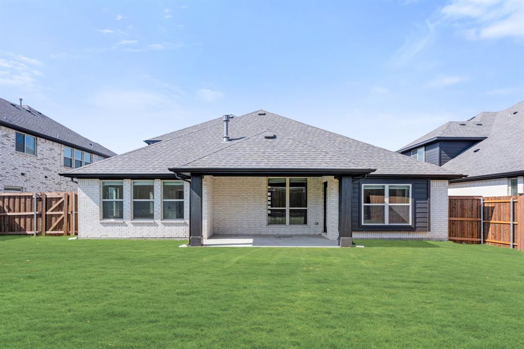 2018 Dundalk Lane Forney, TX 75126 - Photo 39 of 40 front view of a house with a yard