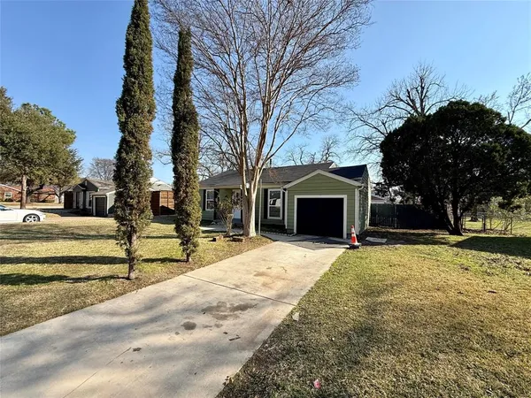 a house with trees in front of it