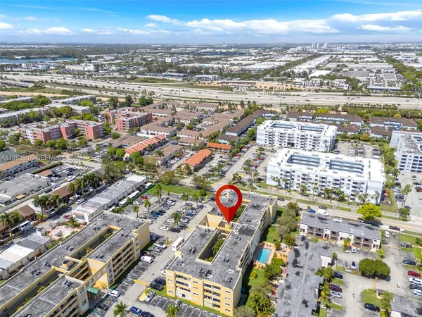 an aerial view of a city with lots of residential buildings