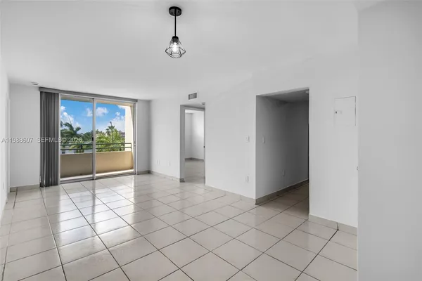 a view of an empty room and window