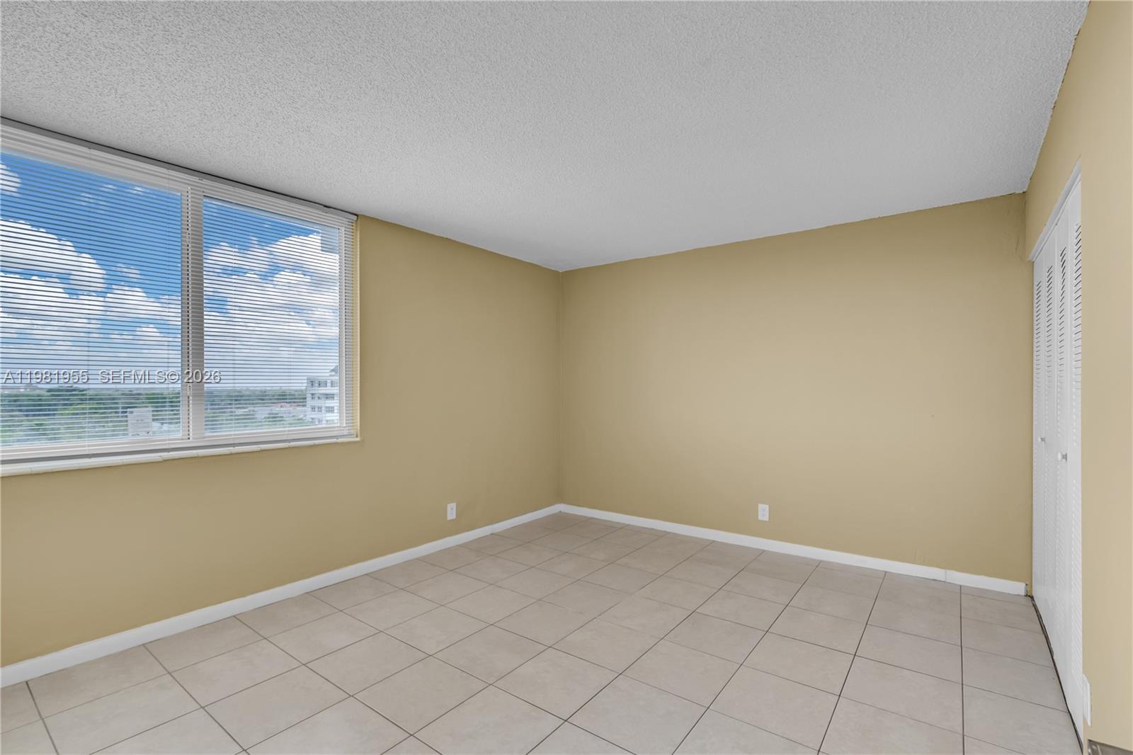 9143 Southwest 77th Avenue, Unit B802 Miami, FL 33156 - Photo 16 of 33 a view of a room with window