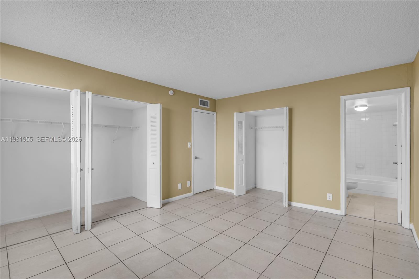 9143 Southwest 77th Avenue, Unit B802 Miami, FL 33156 - Photo 18 of 33 a view of an empty room