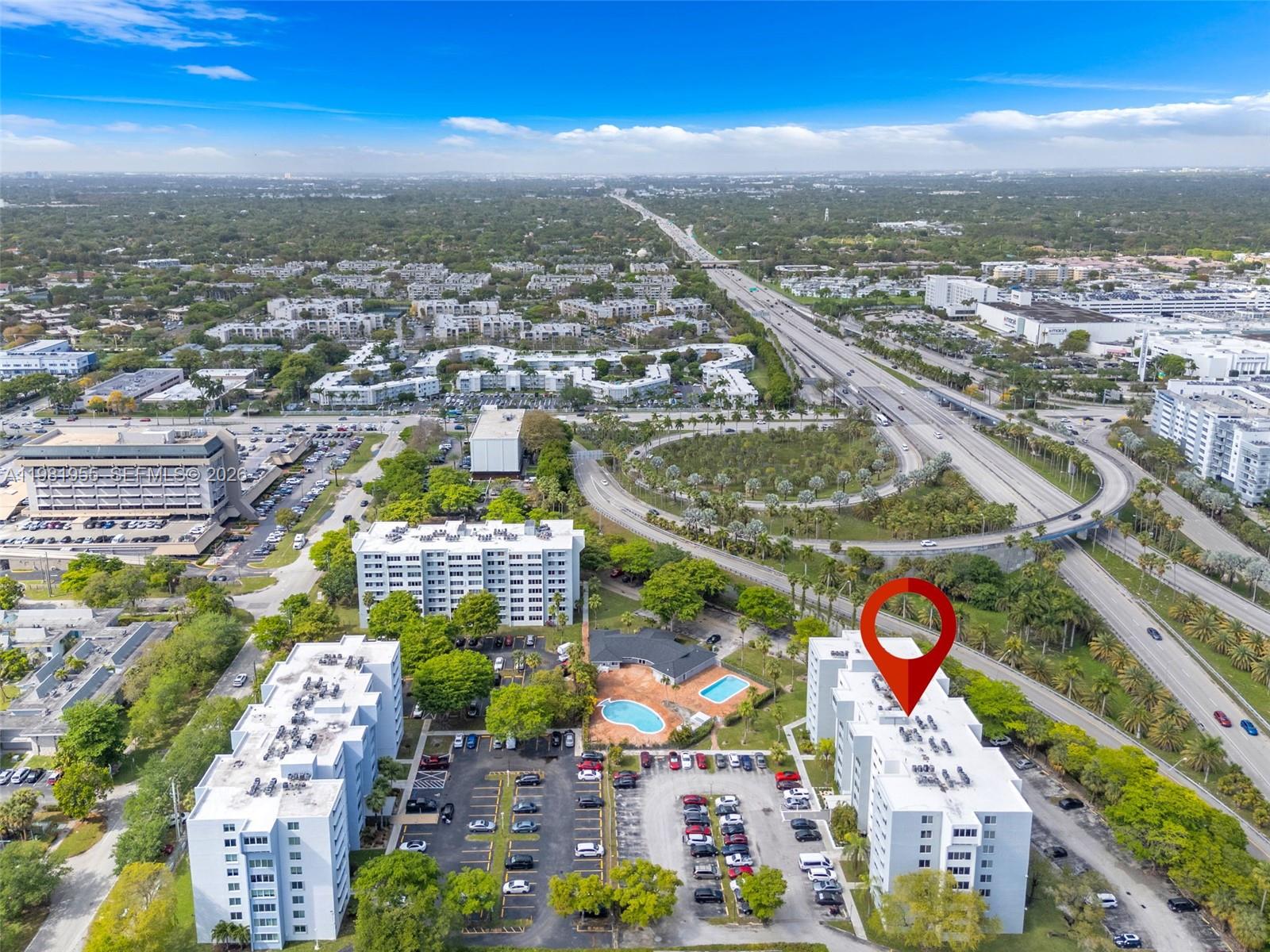 9143 Southwest 77th Avenue, Unit B802 Miami, FL 33156 - Photo 29 of 33 an aerial view of residential houses with outdoor space
