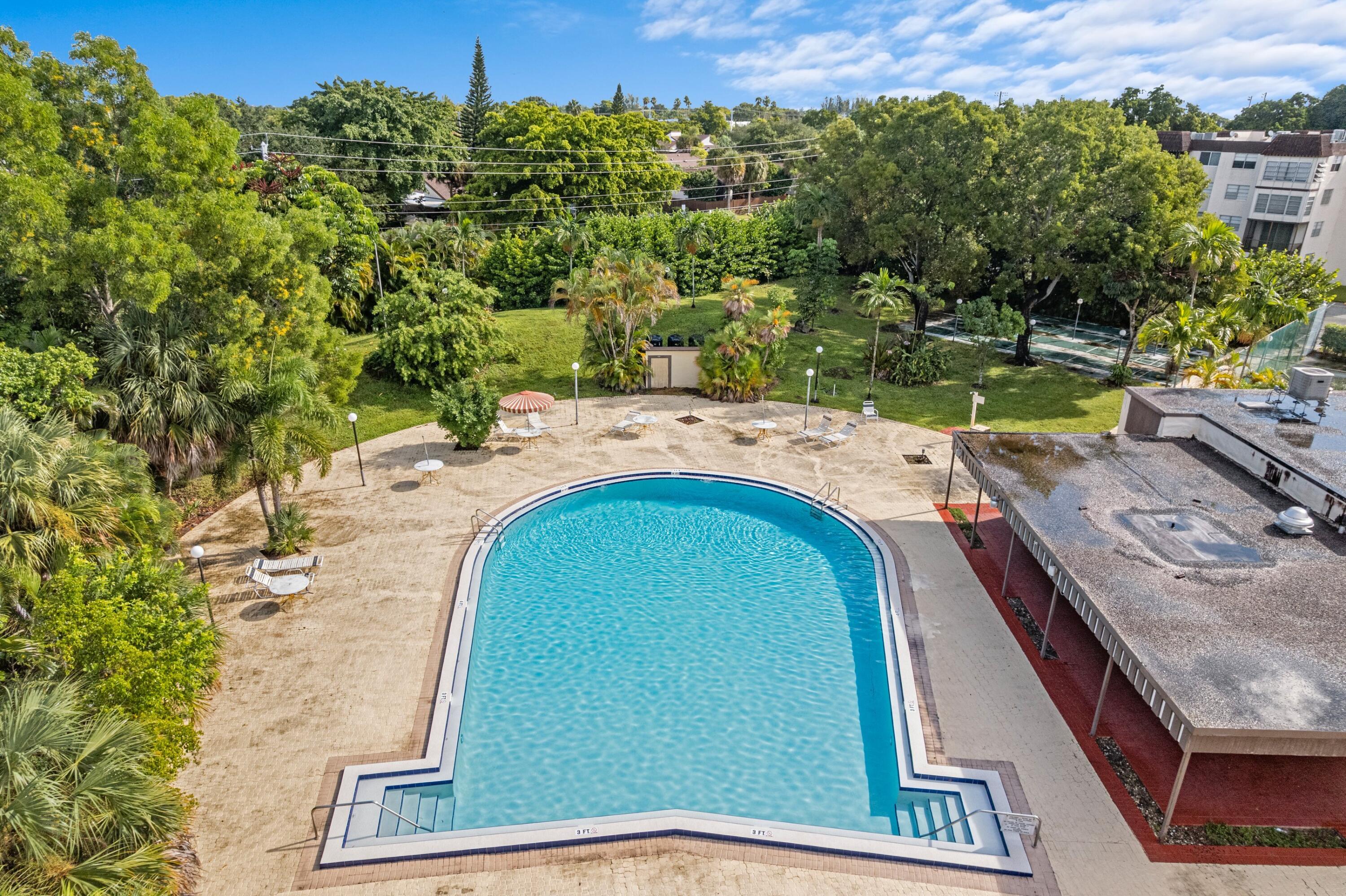 7000 Northwest 17th Street, Unit 419 Plantation, FL 33313 - Photo 18 of 23 an aerial view of a house with a yard