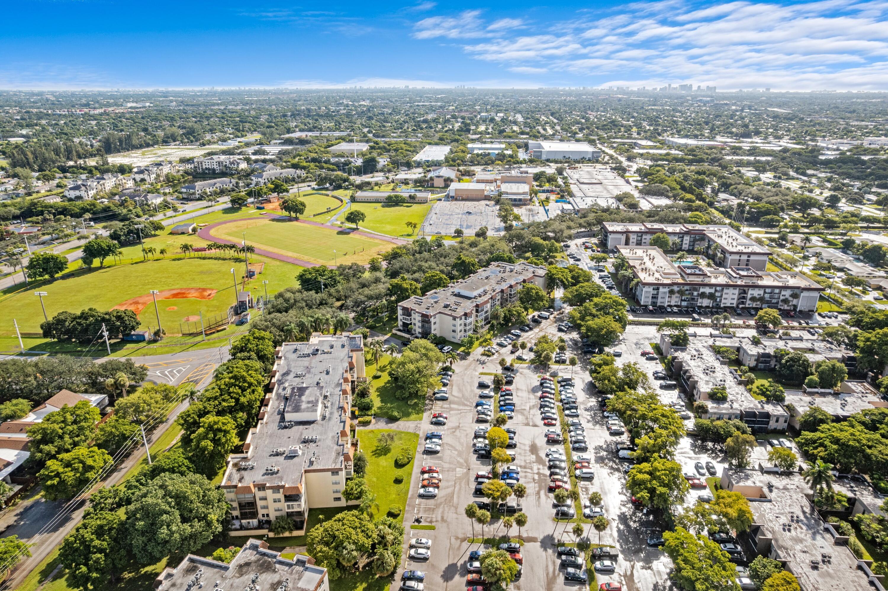 7000 Northwest 17th Street, Unit 419 Plantation, FL 33313 - Photo 20 of 23 an aerial view of residential houses with outdoor space