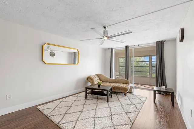 a living room with a couch and a table