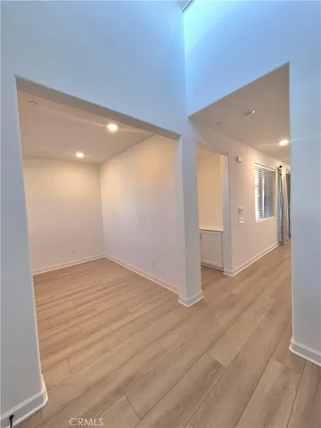 a bathroom with a sink toilet and a window