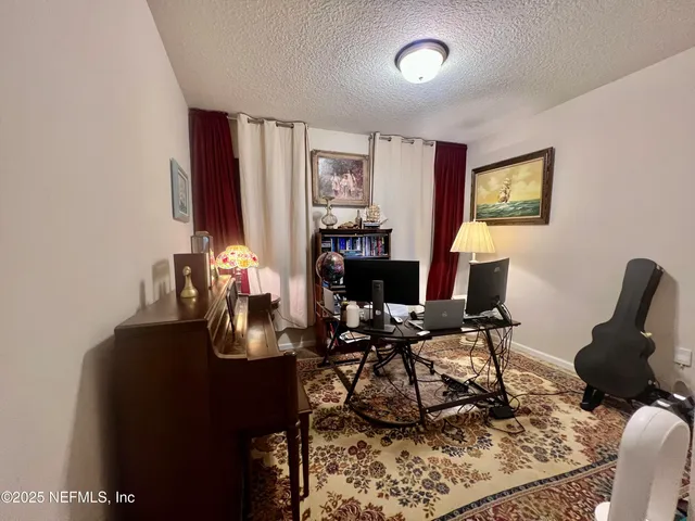 a bathroom with a shower and a tub
