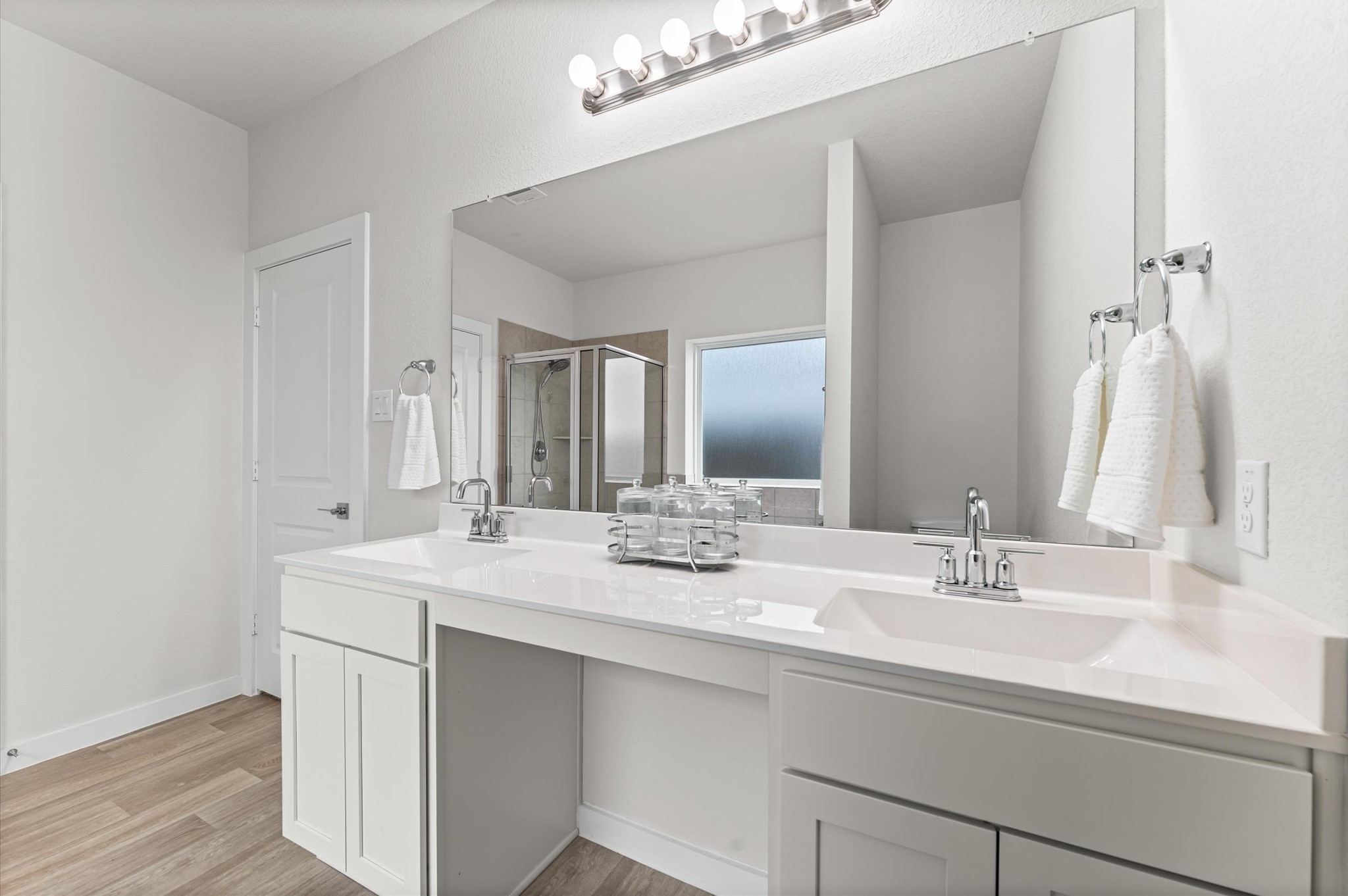 21431 Indigo Ruth Drive Spring, TX 77379 - Photo 12 of 19 a bathroom with a sink and a mirror