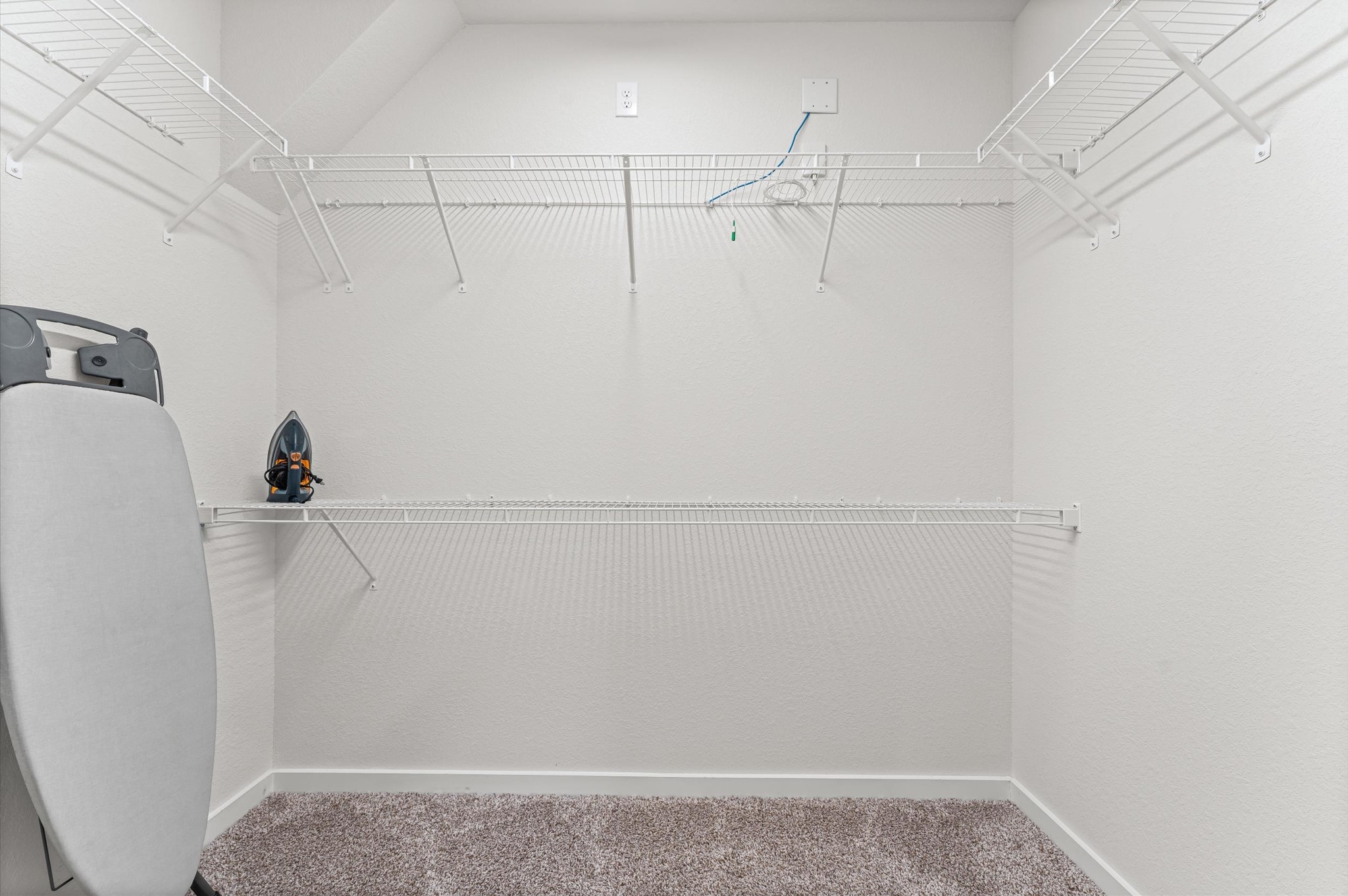 21431 Indigo Ruth Drive Spring, TX 77379 - Photo 13 of 19 a view of small space with racks on the wall