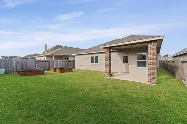 a front view of a house with yard