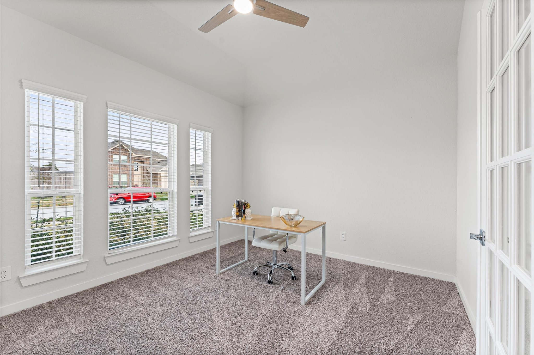21431 Indigo Ruth Drive Spring, TX 77379 - Photo 9 of 19 a living room with furniture a dining table and a large window