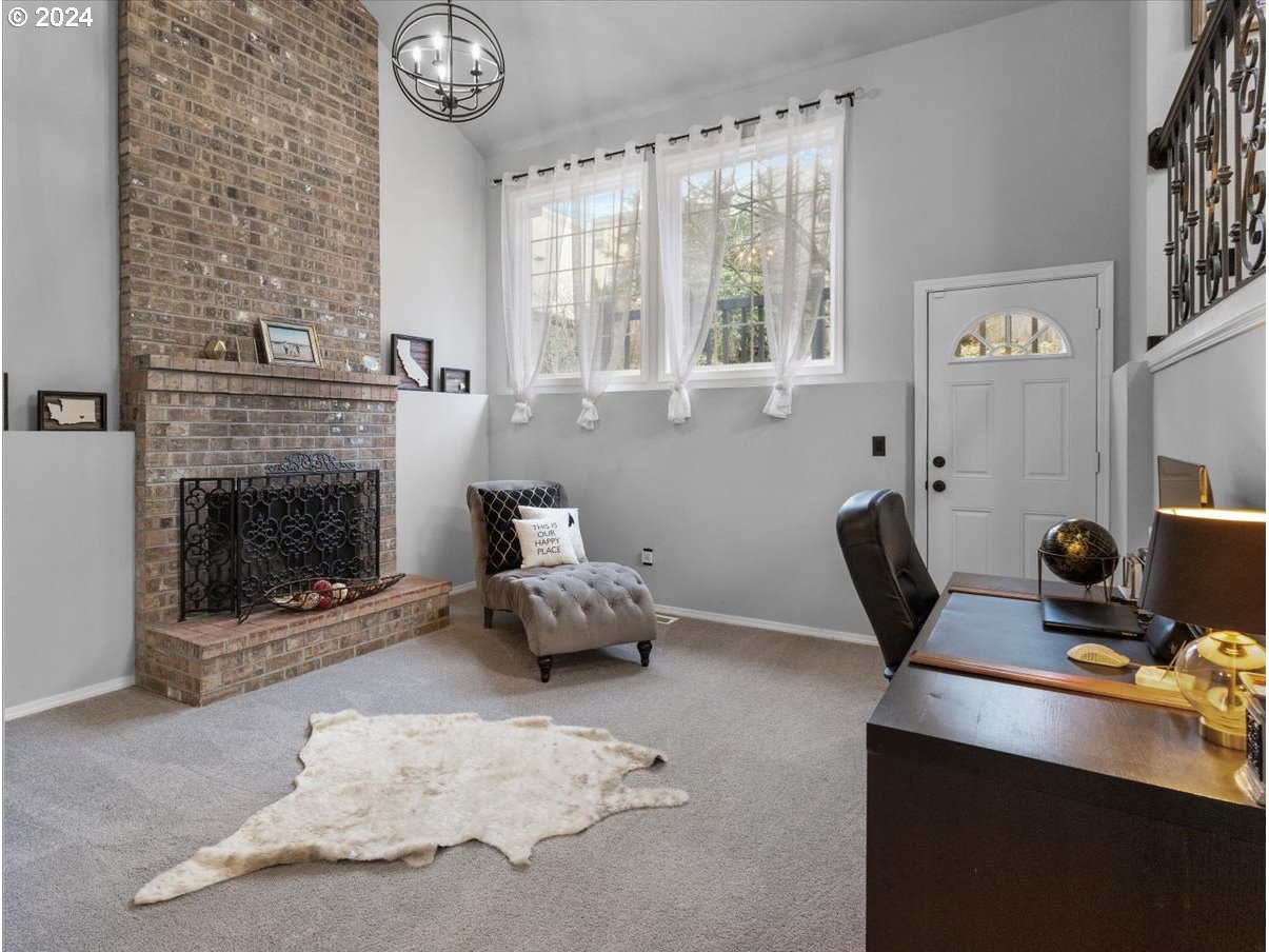 1990 Southwest Willow Parkway Gresham, OR 97080 - Photo 15 of 46 a living room with furniture and a fireplace