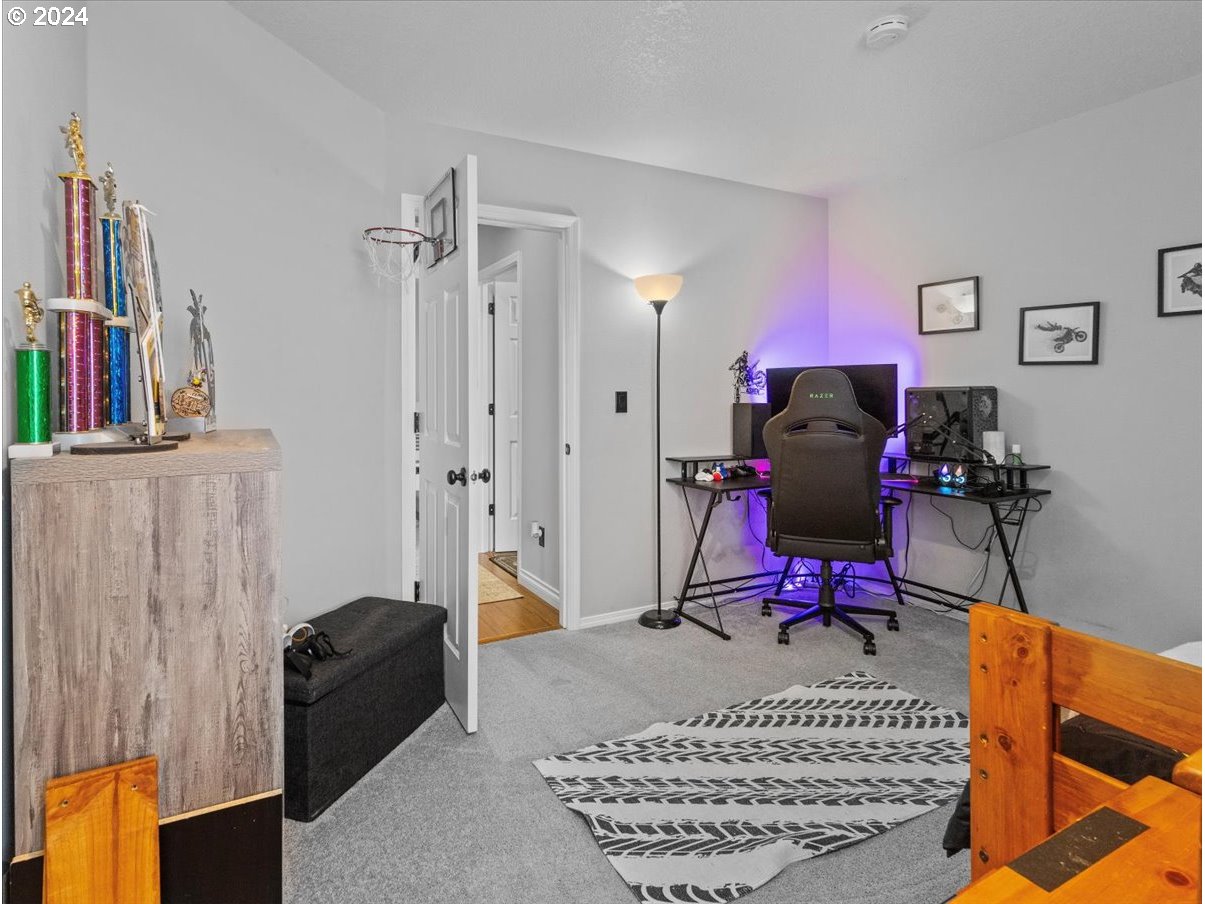 1990 Southwest Willow Parkway Gresham, OR 97080 - Photo 28 of 46 a view of a workspace with furniture and gym equipment