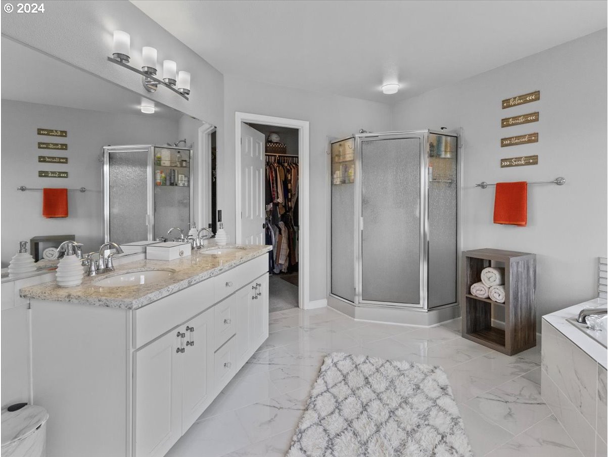 1990 Southwest Willow Parkway Gresham, OR 97080 - Photo 34 of 46 a bathroom with a double vanity sink mirror and toilet