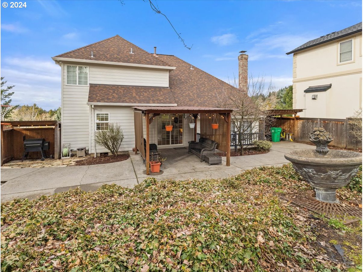 1990 Southwest Willow Parkway Gresham, OR 97080 - Photo 38 of 46 a view of a house with a patio