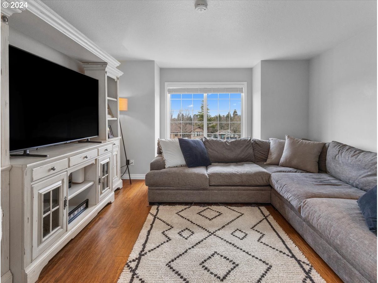 1990 Southwest Willow Parkway Gresham, OR 97080 - Photo 7 of 46 a living room with furniture and a flat screen tv