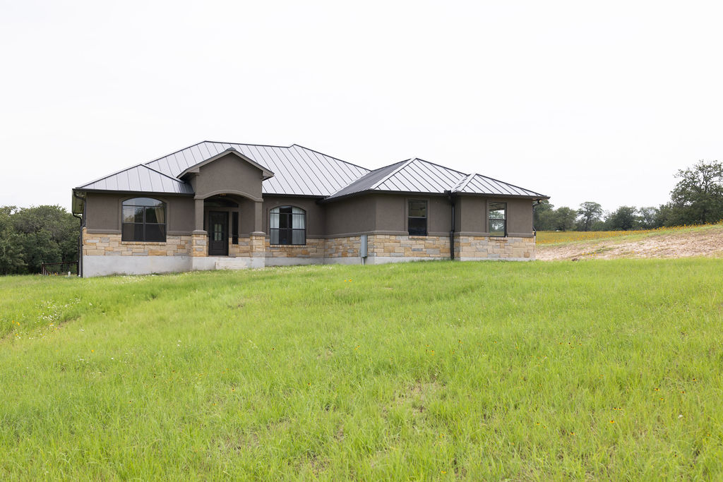 111 Powder Ridge Luling, TX 78648 - Photo 17 of 22 A new construction home with elegant stone and stucco finishes awaits its first owners.