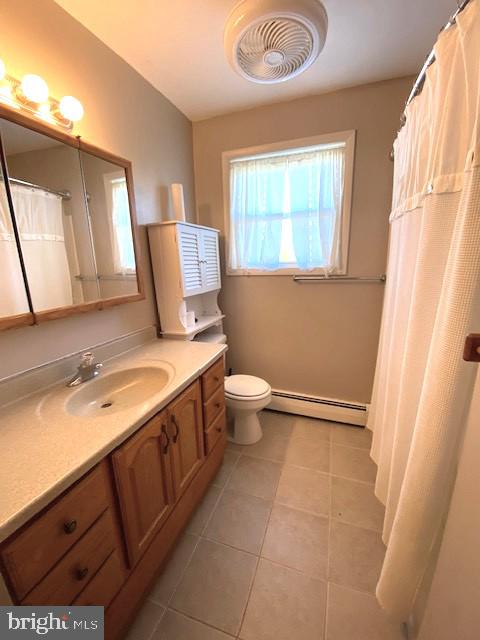7501 Spring Creek Road Macungie, PA 18062 - Photo 11 of 16 a bathroom with a sink a toilet and a window