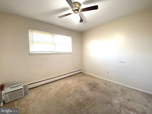 7501 Spring Creek Road Macungie, PA 18062 - Photo 12 of 16 an empty room with windows and fan