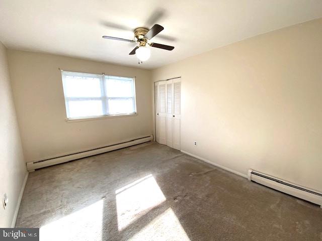 7501 Spring Creek Road Macungie, PA 18062 - Photo 13 of 16 an empty room with windows and fan