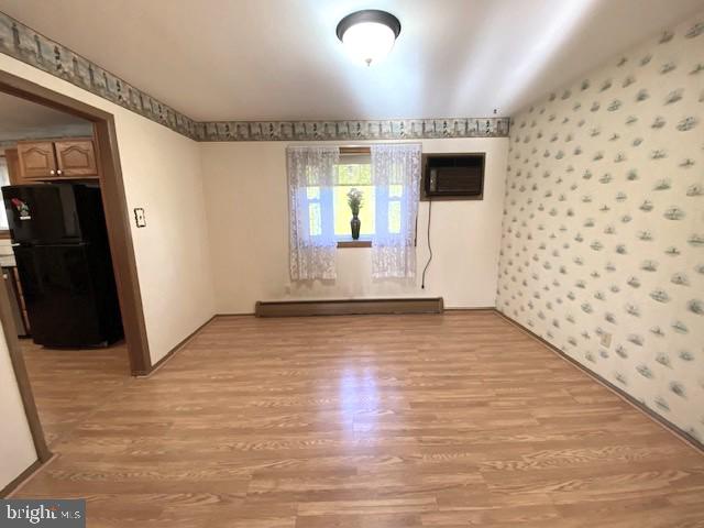 7501 Spring Creek Road Macungie, PA 18062 - Photo 4 of 16 a view of empty room with wooden floor