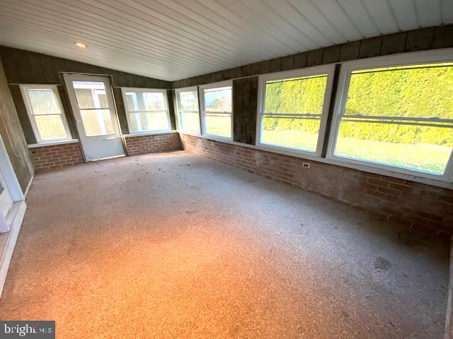 7501 Spring Creek Road Macungie, PA 18062 - Photo 10 of 16 a large room with a large window and front door