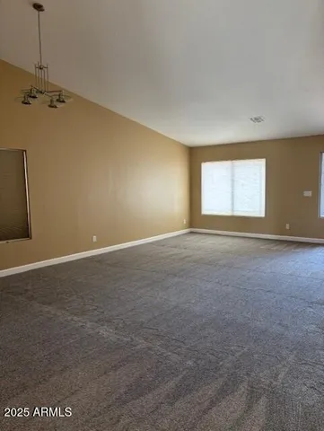 a view of backyard with green space