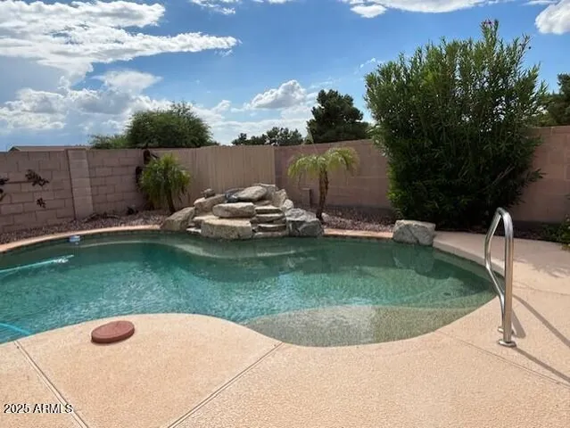 a view of a backyard of the house