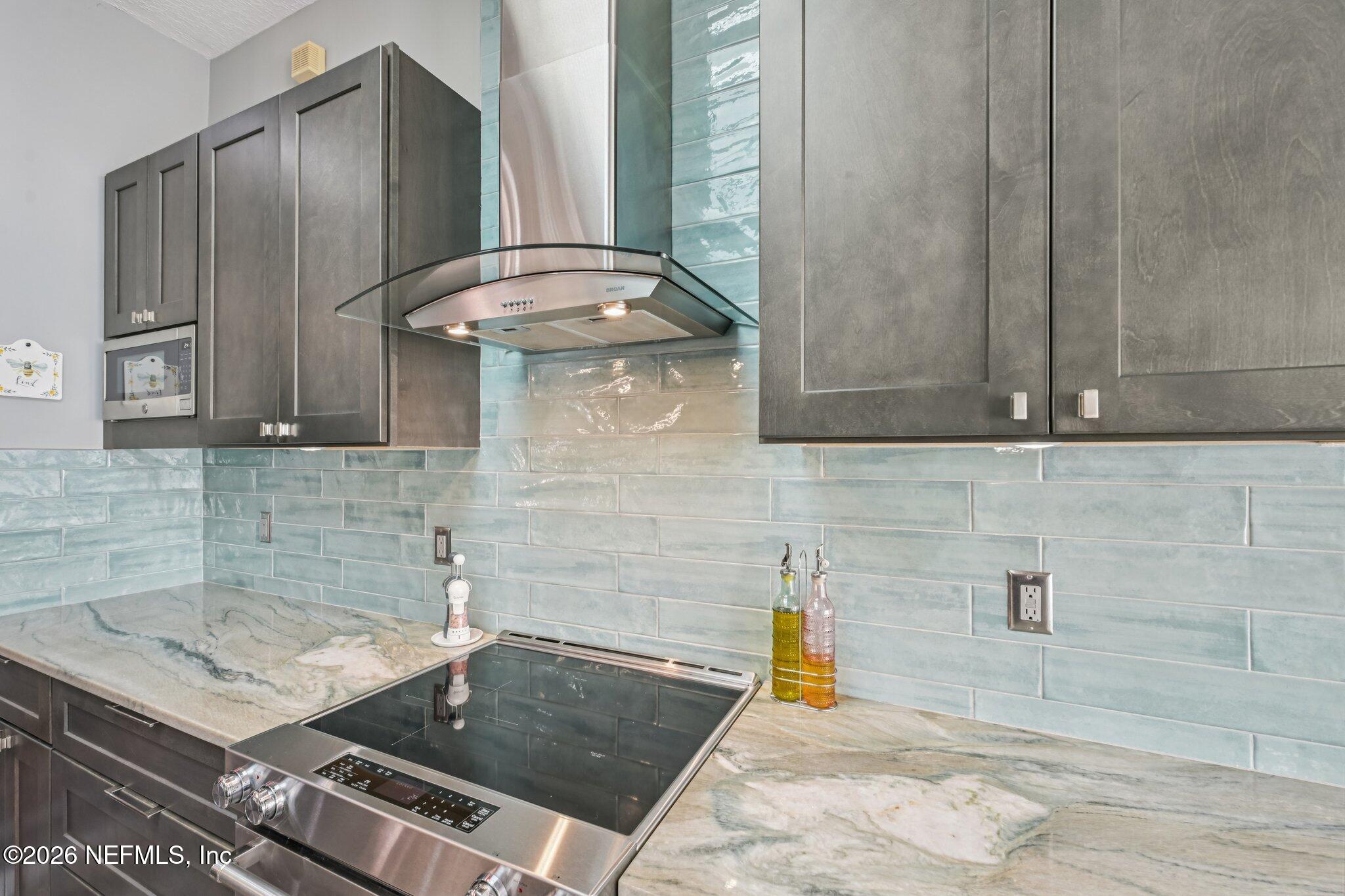 1764 Redwood Lane Middleburg, FL 32068 - Photo 5 of 62 42" cabinets and range hood