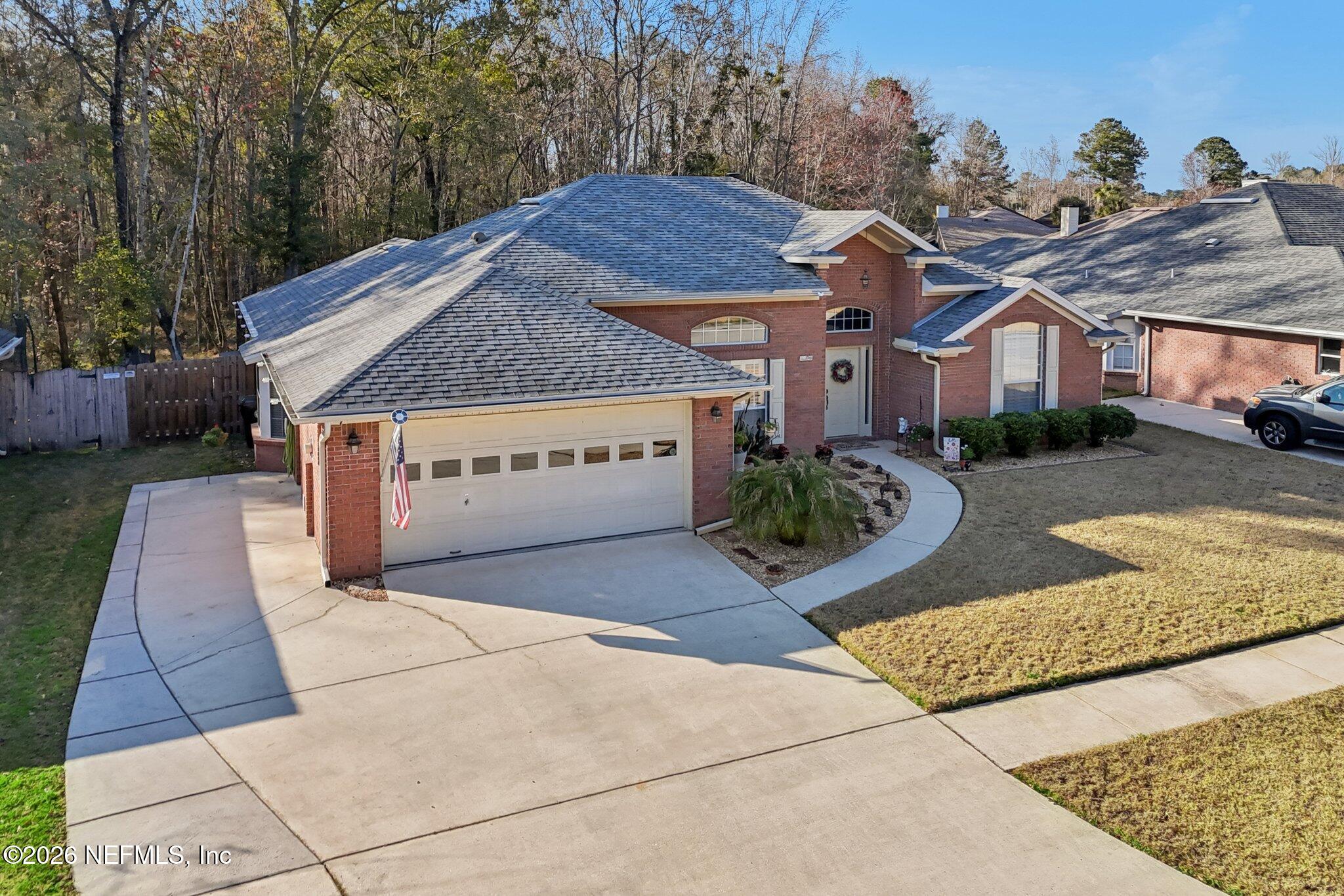 1764 Redwood Lane Middleburg, FL 32068 - Photo 51 of 62 elevated with driveway view