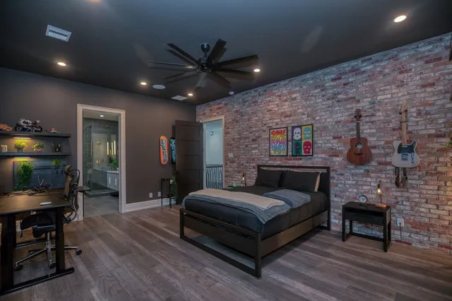a living room with a couch and a fireplace