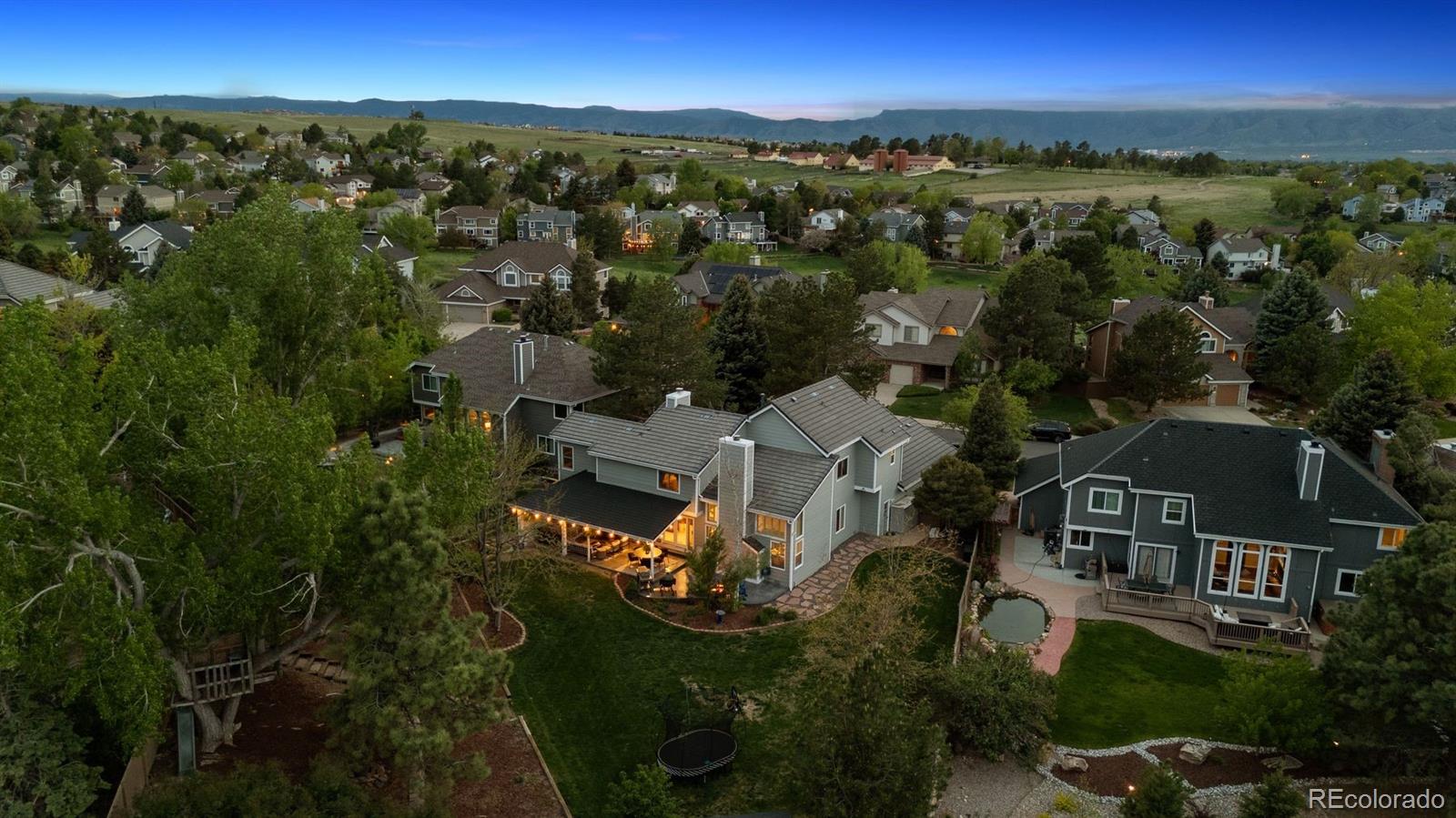 2187 Wynterbrook Drive Highlands Ranch, CO 80126 - Photo 2 of 41 an aerial view of a house with a yard