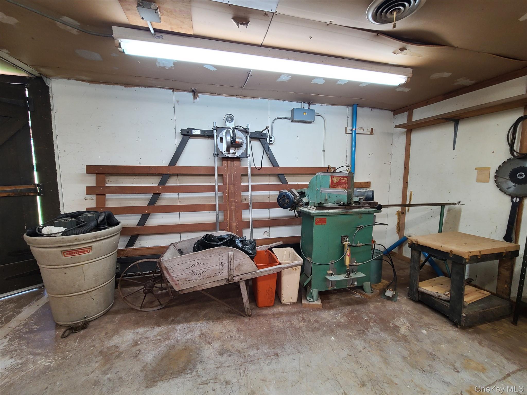 153 Shore Road Swan Lake, NY 12783 - Photo 17 of 39 a view of gym equipment and windows