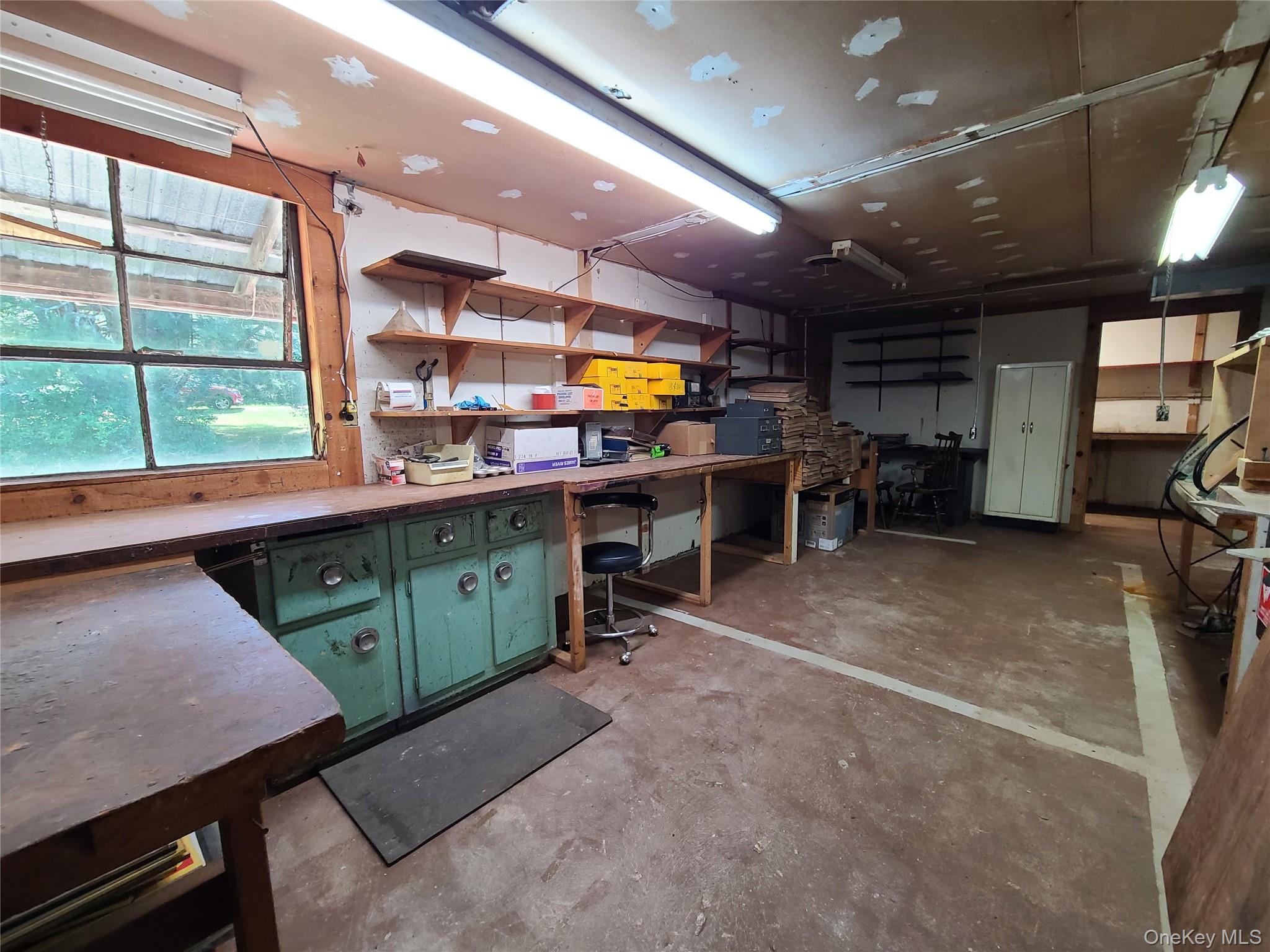 153 Shore Road Swan Lake, NY 12783 - Photo 22 of 39 a kitchen with lots of counter top space