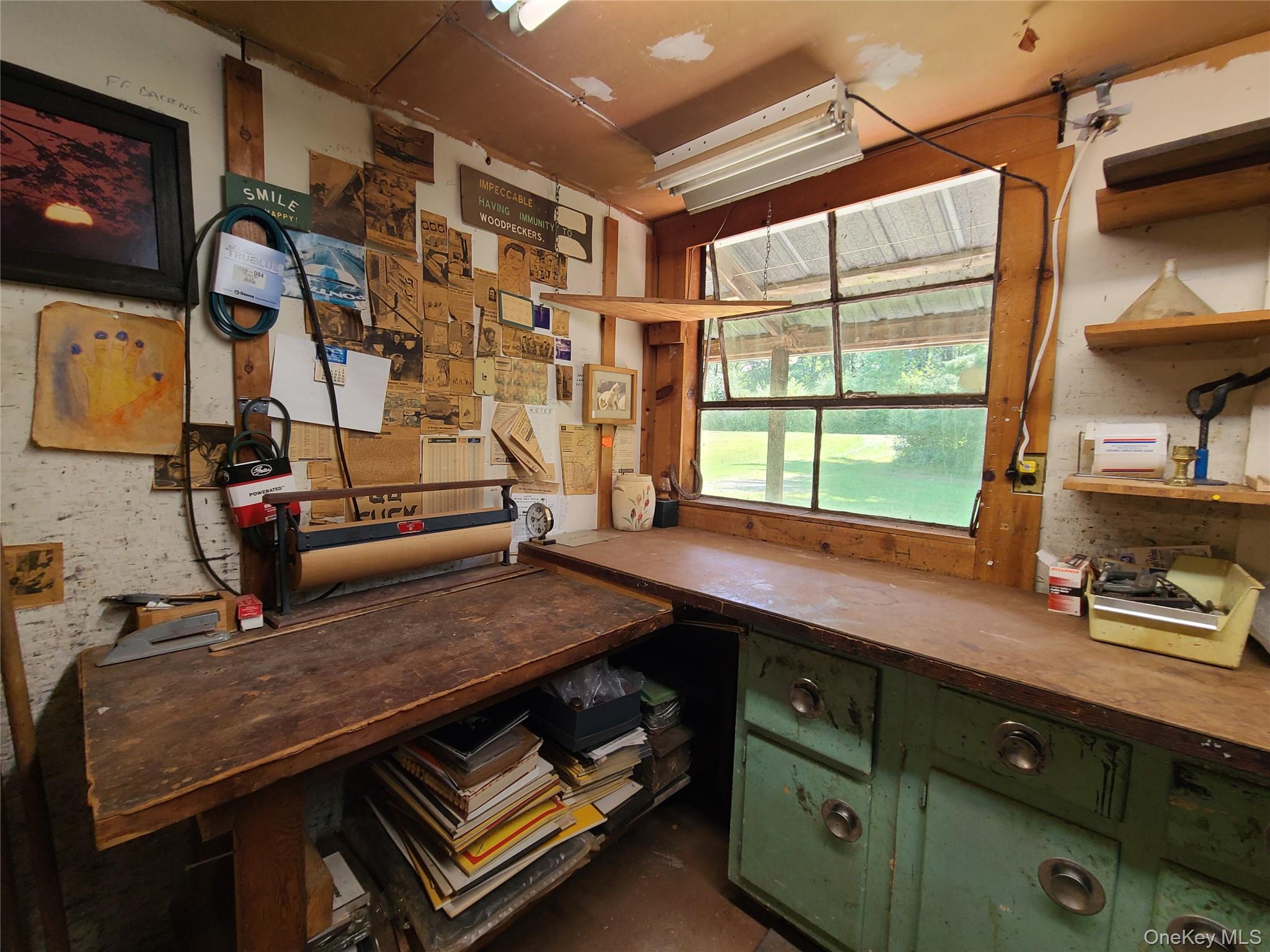 153 Shore Road Swan Lake, NY 12783 - Photo 25 of 39 a kitchen with a sink cabinets and window
