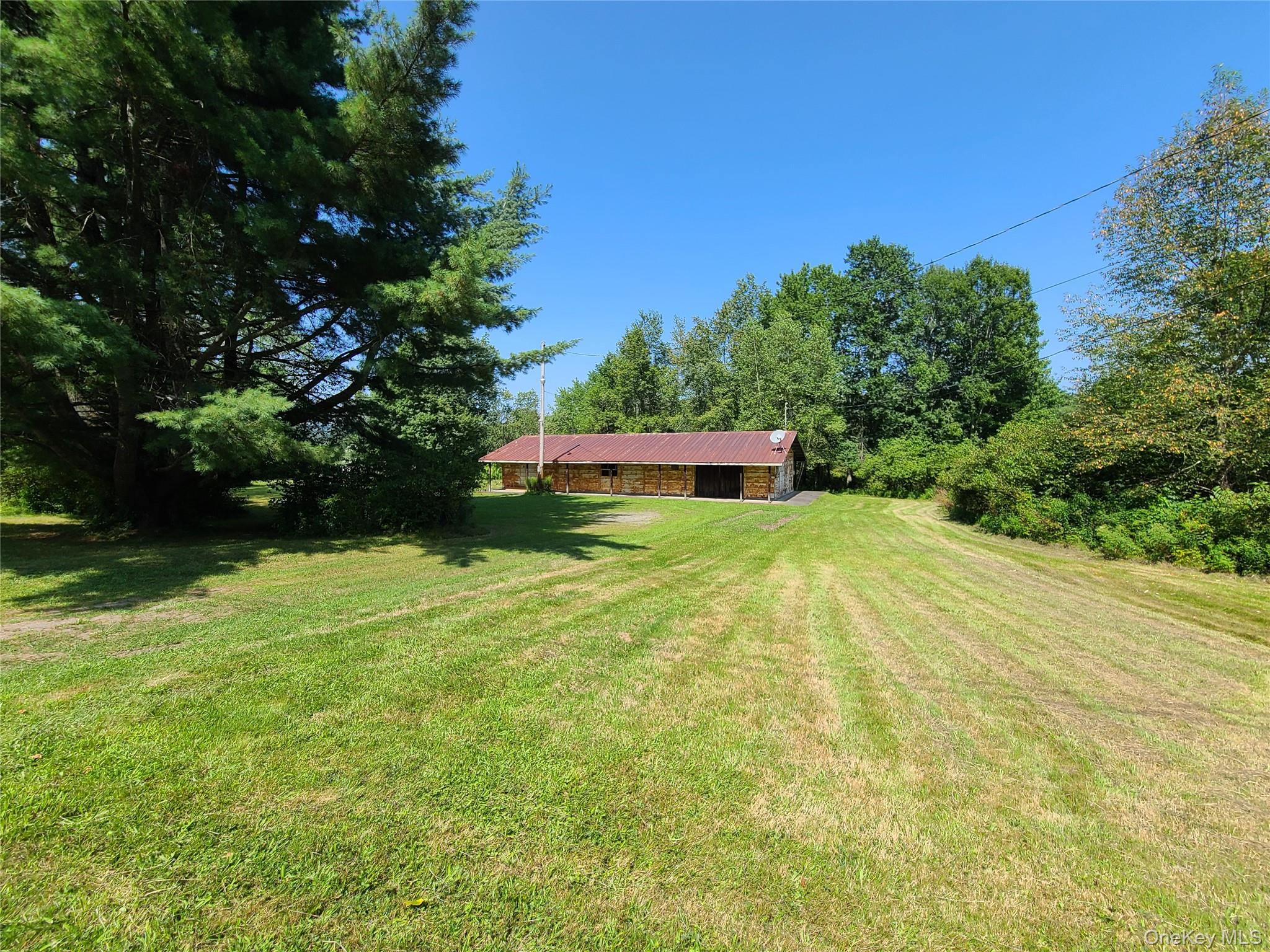 153 Shore Road Swan Lake, NY 12783 - Photo 7 of 39 a view of an outdoor space