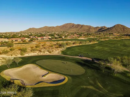 a view of a lake with a city