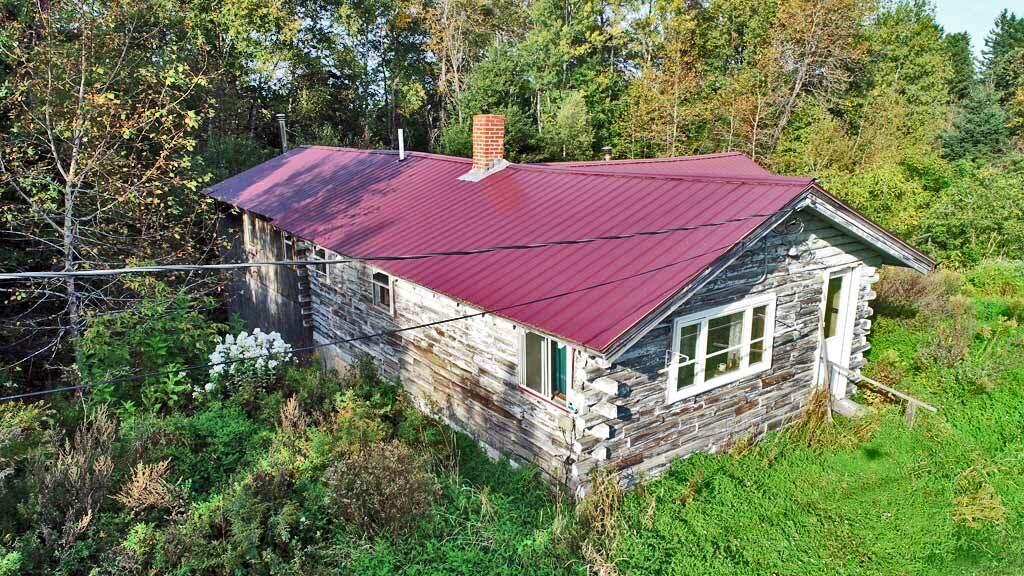 1719 Ludlow Road Houlton, ME 04730 - Photo 2 of 47 ludlow-log-home-drone