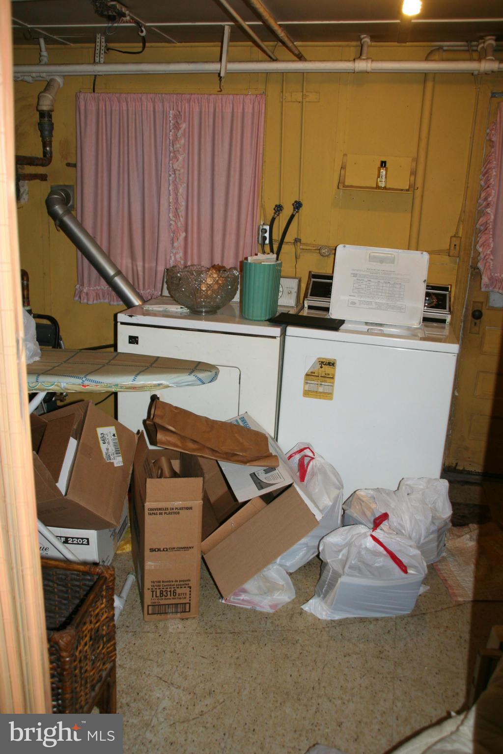 1637 R Street Southeast Washington, DC 20020 - Photo 19 of 22 Basement - Laundry Area w/ Washer & Dryer