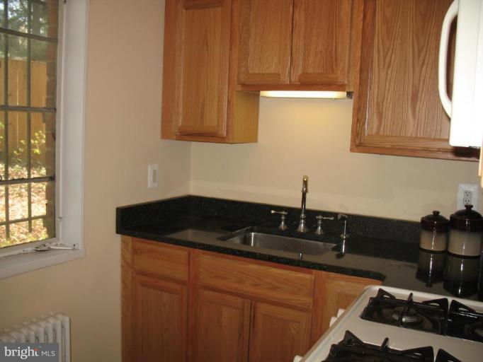 8718 Manchester Road, Unit 2 Silver Spring, MD 20901 - Photo 3 of 15 New Kraftmaid cabinets, granite, tile floor