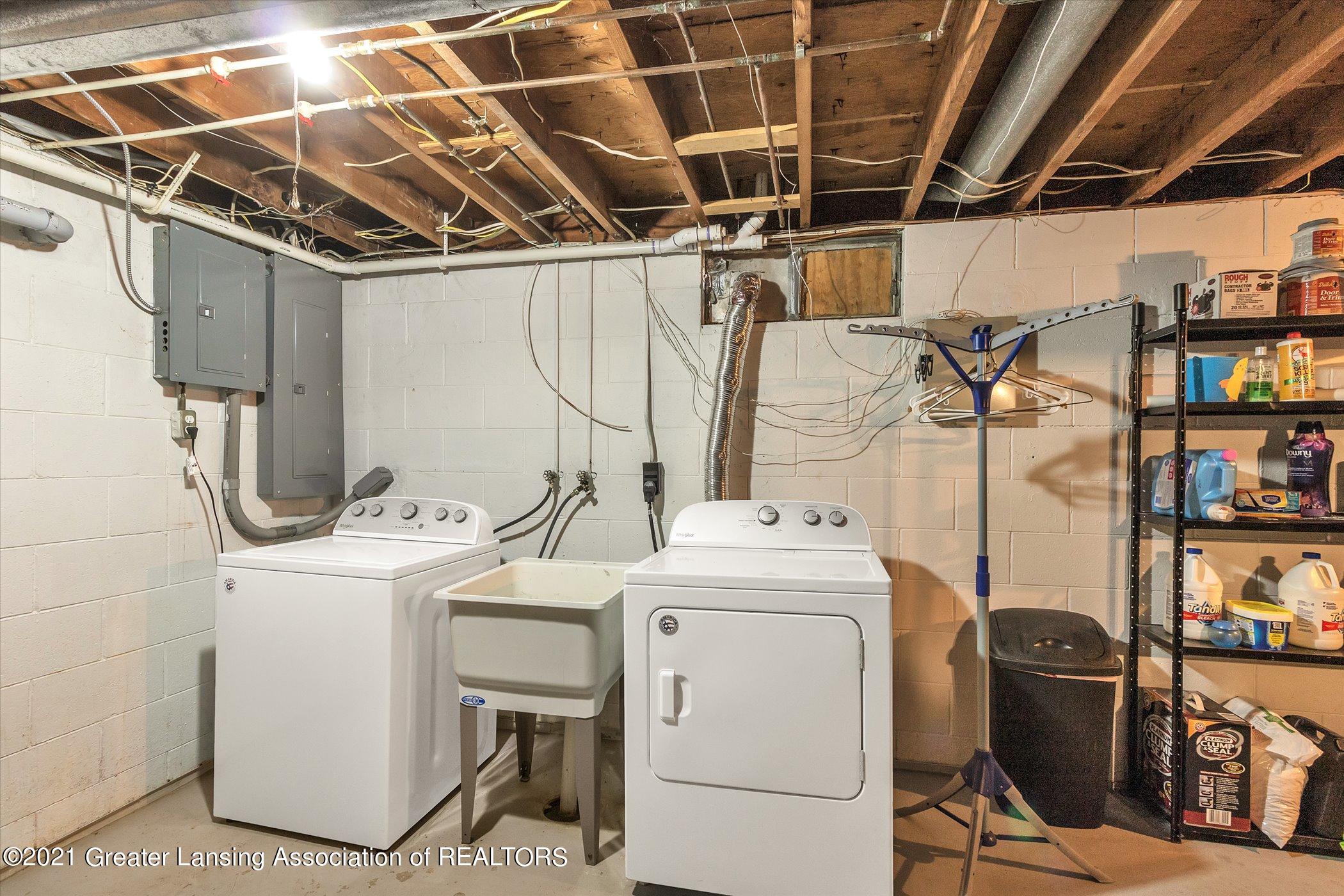 1327 Pierce Road Lansing, MI 48910 - Photo 27 of 34 Laundry in Basement