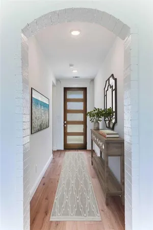 a view of kitchen with wooden floor