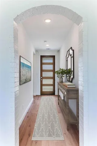 a view of kitchen with wooden floor