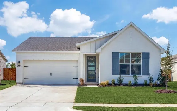 a large kitchen with granite countertop a large counter top stainless steel appliances and cabinets