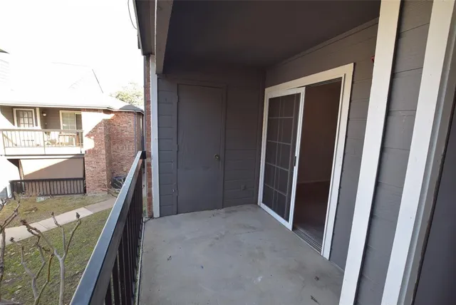 a view of a hallway and furniture