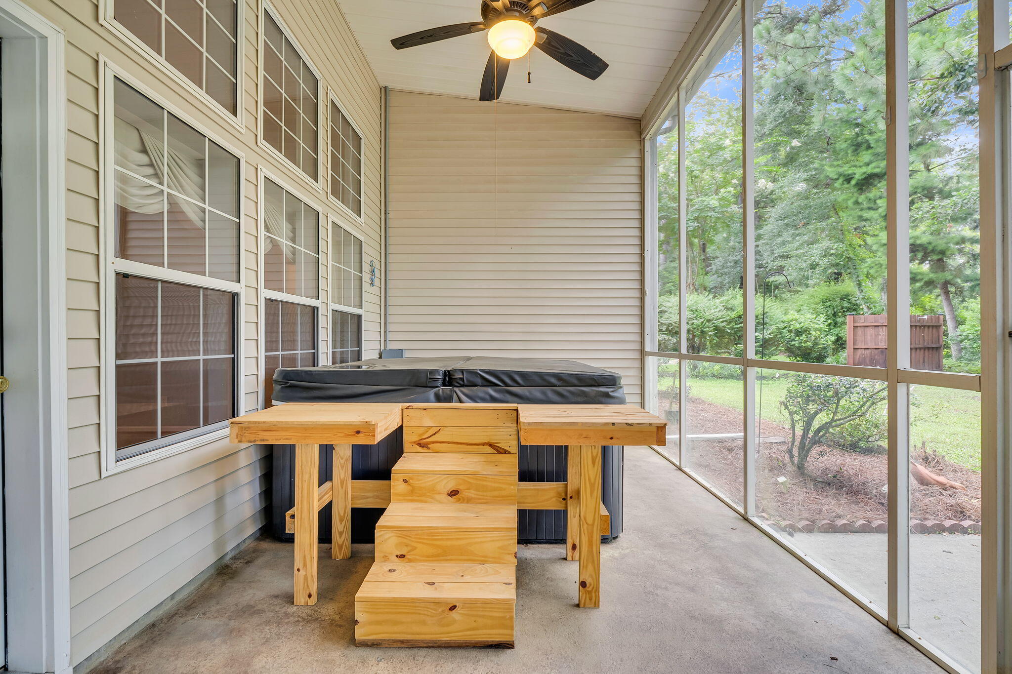 802 Long Drive Road Summerville, SC 29485 - Photo 53 of 84 Screened-in porch with hot tub
